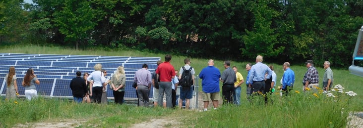 Group taking a tour on community solar gardens at Lake Region Electric Cooperative in Minnesota