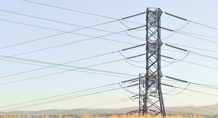 Power lines in front of an open sky